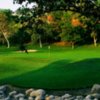 A view of hole #5 from right of green over creek bed towards green at Coyote Hills Golf Course