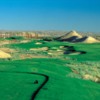 A view of green guarded by sand traps from Golf Club At Terra Lago