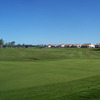 A view of hole #12 with houses in background at Castle Oaks Golf Club