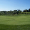 A view of the 11th hole with bunker in background at Castle Oaks Golf Club