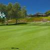 A view of green at The SCGA Member's Club at Rancho California with clubhouse in background