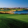 A view of green with water on the right at Rooster Run Golf Club