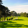 A sunny day view of a hole at Presidio Golf Course