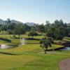 A view of green #13 surrounded by water at Canyon Lake Country Club.