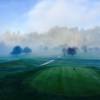 A view of a green surrounded by mist at Eureka Golf Course.