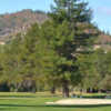 A sunny day view of a hole at Ukiah Valley Golf Course.