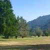 A sunny day view of a fairway at Bigfoot Golf & Country Club.