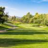 A sunny day view from a tee at Twin Oaks Golf Course.