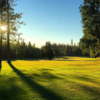 A sunny day view of a fairway at Black Rock Golf Course.