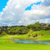 A sunny day view over the water of hole #18 at Fountaingrove Golf & Athletic Club.