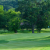 A view of a green flanked by bunkers at Sugarloaf Golf Club.