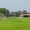 A view of a hole and the clubhouse at  Santa Ana Country Club .