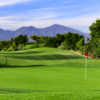 A sunny day view of a hole at Tijeras Creek Golf Club.