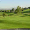 A splendid sunny day view of a hole at Royal Vista Golf Club.