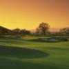 A sunset view of a hole at San Juan Oaks Golf Club.