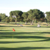 A sunny day view of a hole at Riverside of Fresno Golf Course.