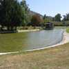 A view of the cabin and lake at Santa Paula Community Golf Course