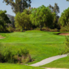 A view of a green flanked by bunkers at Reidy Creek Golf Course.