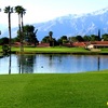 A view over the water of the 2nd green at Mission Lakes Country Club