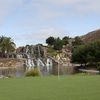 A view of the 18th green with waterfall in background at Silver Creek Valley Country Club