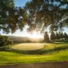 A sunny day view of a green at Moraga Country Club.