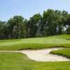 View of a green and bunker at Teleli Golf Club