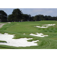 Old-style fairway bunkers provide protection to the par-4 ninth on the Black Horse golf course.
