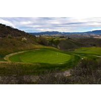 The sixth green at Tierra Rejada Golf Club looks like a stage at some mystical theater.