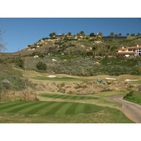 The par-3 fourth at Maderas Golf Club plays over a ravine.