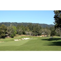 The long par-4 10th hole at Pasatiempo Golf Club doglegs left to a green guarded by a large trap on the left. 