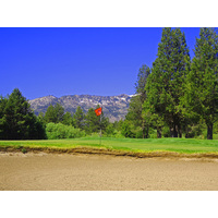 The 12th hole at Lake Tahoe G.C. is a par 4 with a sharp dogleg left.