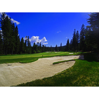 A large fairway bunker looms on the corner of the dogleg of the par-4 13th at Tahoe Donner Golf Course in Truckee, California.