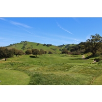 The fourth hole at San Juan Oaks Golf Club plays long to an elevated green.