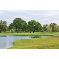 A pond protects the approach shot to the par-5 fourth hole on the MacKenzie Course at the Haggin Oaks Golf Complex in Sacramento.