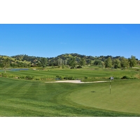 Water separates the split fairway of the par-4 15th hole at Yocha Dehe Golf Club in Brooks, California.
