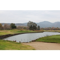 Water guards the 12th hole at Carlton Oaks Golf Club in Santee, California.